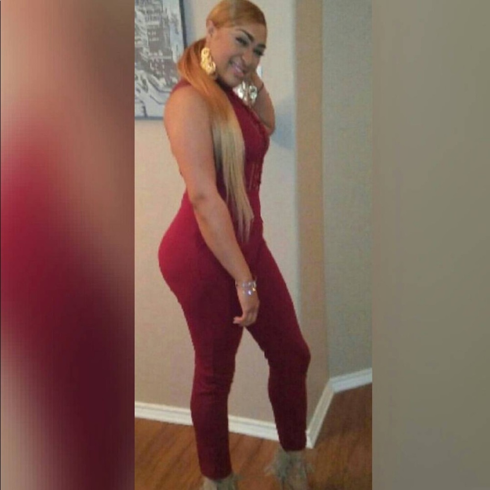 Maroon one piece jump suit medium